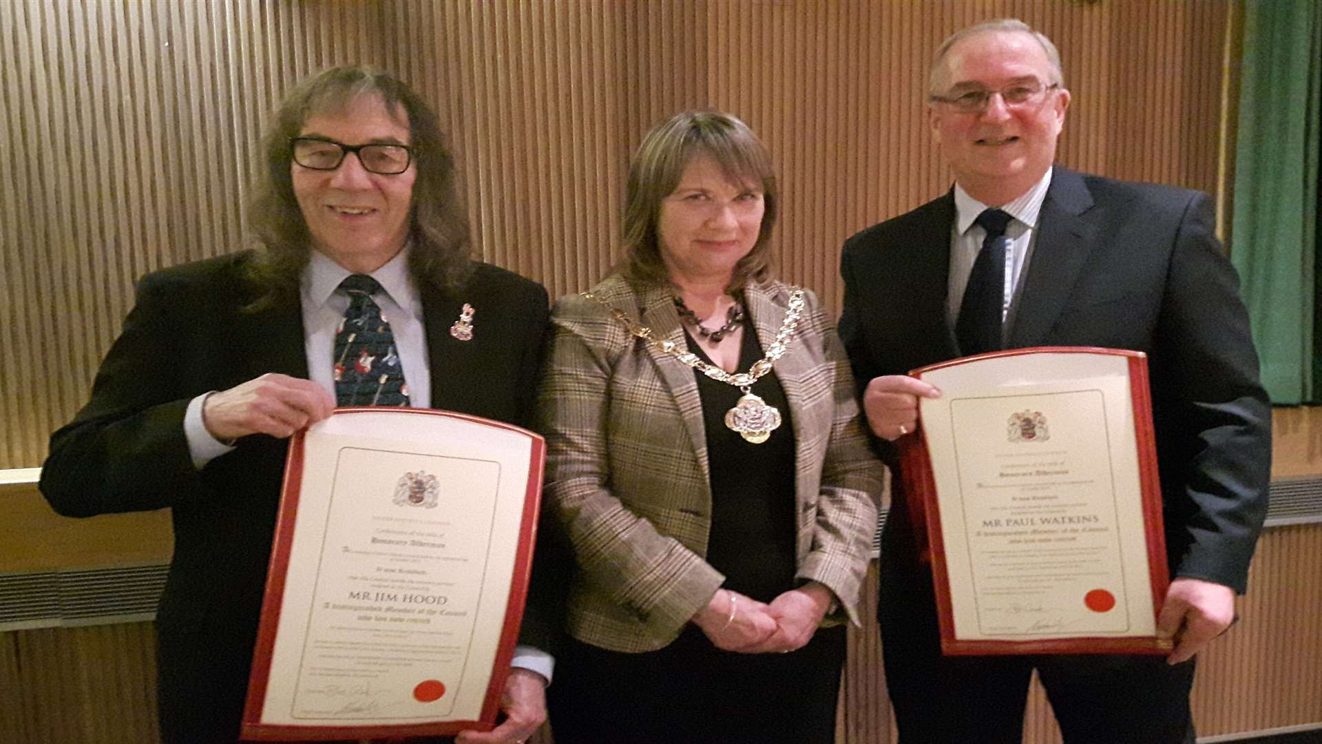 Honorary Aldermen Jim Hood, left, and Paul Watkins with council chairman Sue Chandler