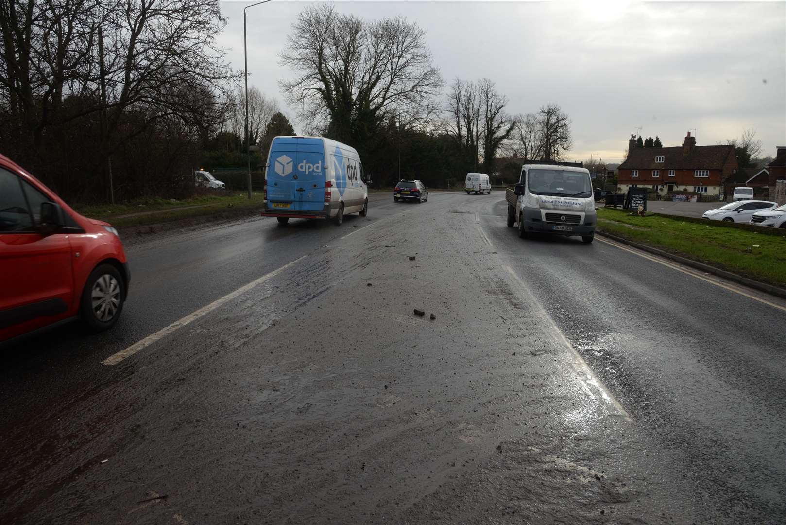 The mud covered London Road at Wrotham near the Invicta Business Park