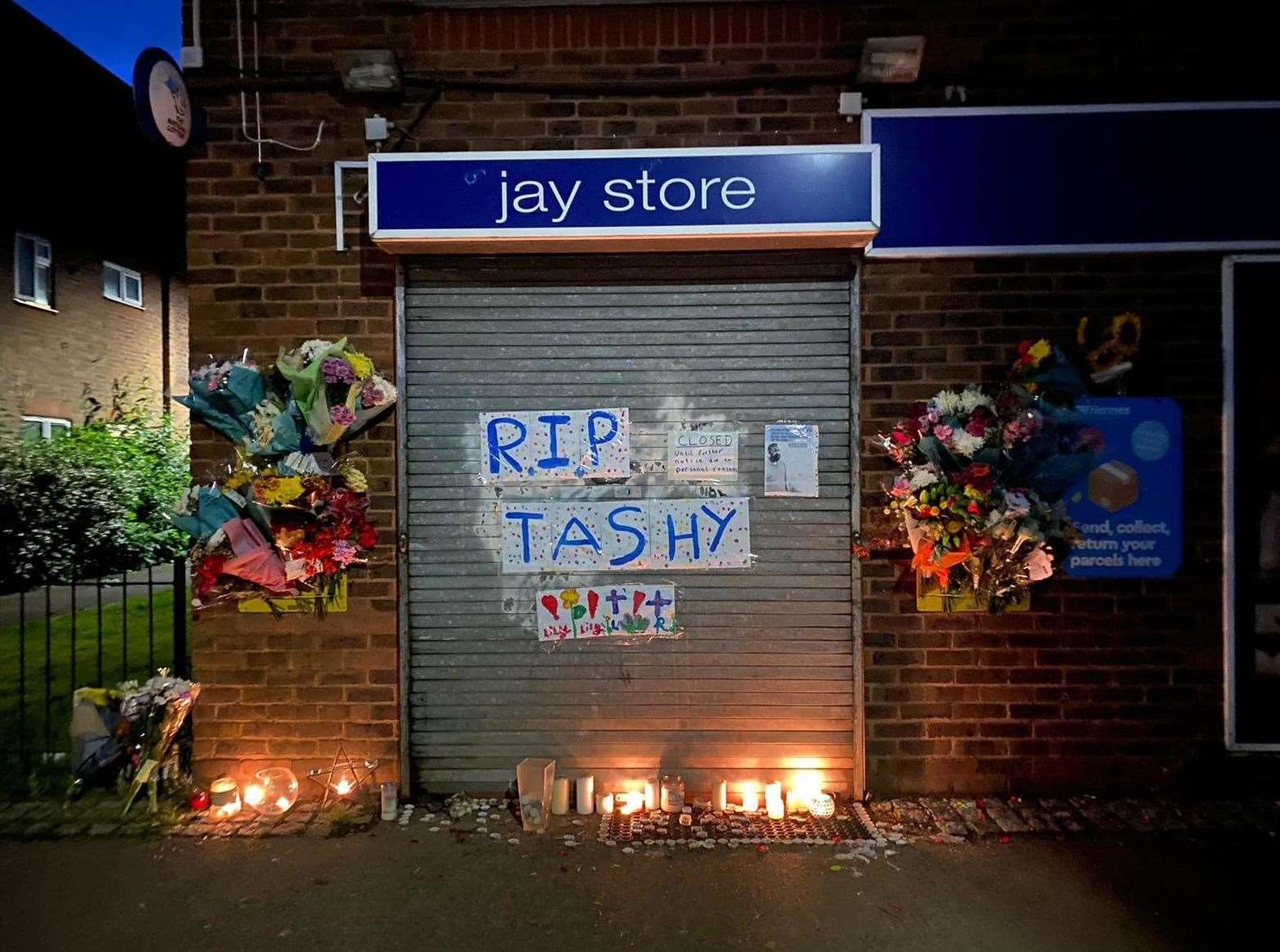 Tributes have been left outside Jay Stores. Picture: Luckshica Kuhatherrshan