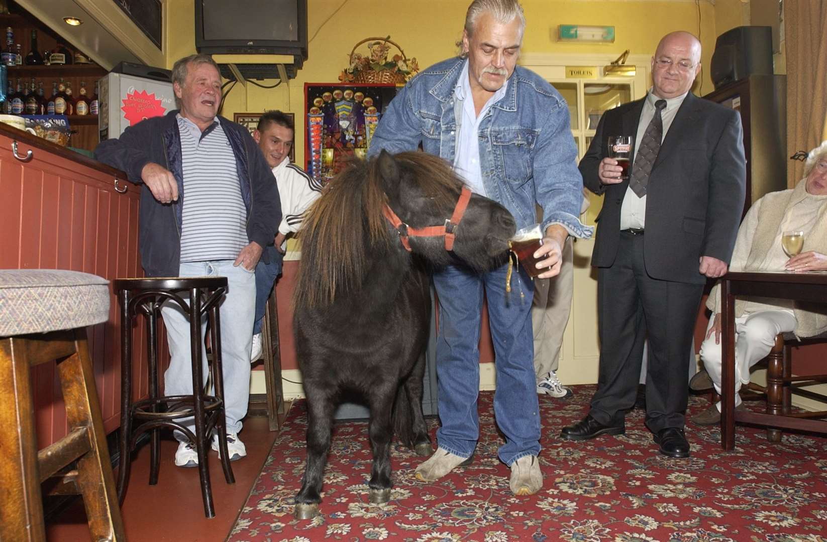 Sparky the Shetland pony with John Baldwin at the Warren pub in New Romney in October 2013. The pub is still going today. Picture: Terry Scott