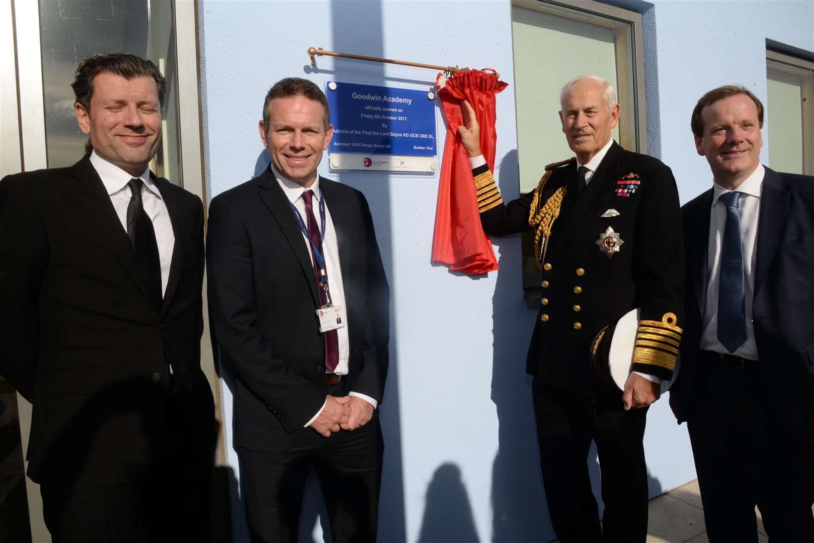 The RNLI in Walmer has paid tribute to Lord Boyce (second in from the right) by lowering their station flag. Picture: Chris Davey