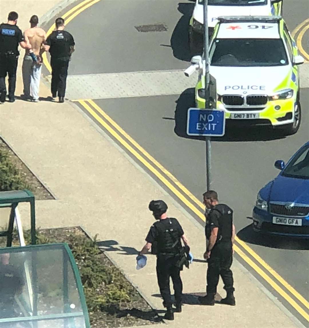 Armed police swooped on Cooney at MidKent College in Gillingham