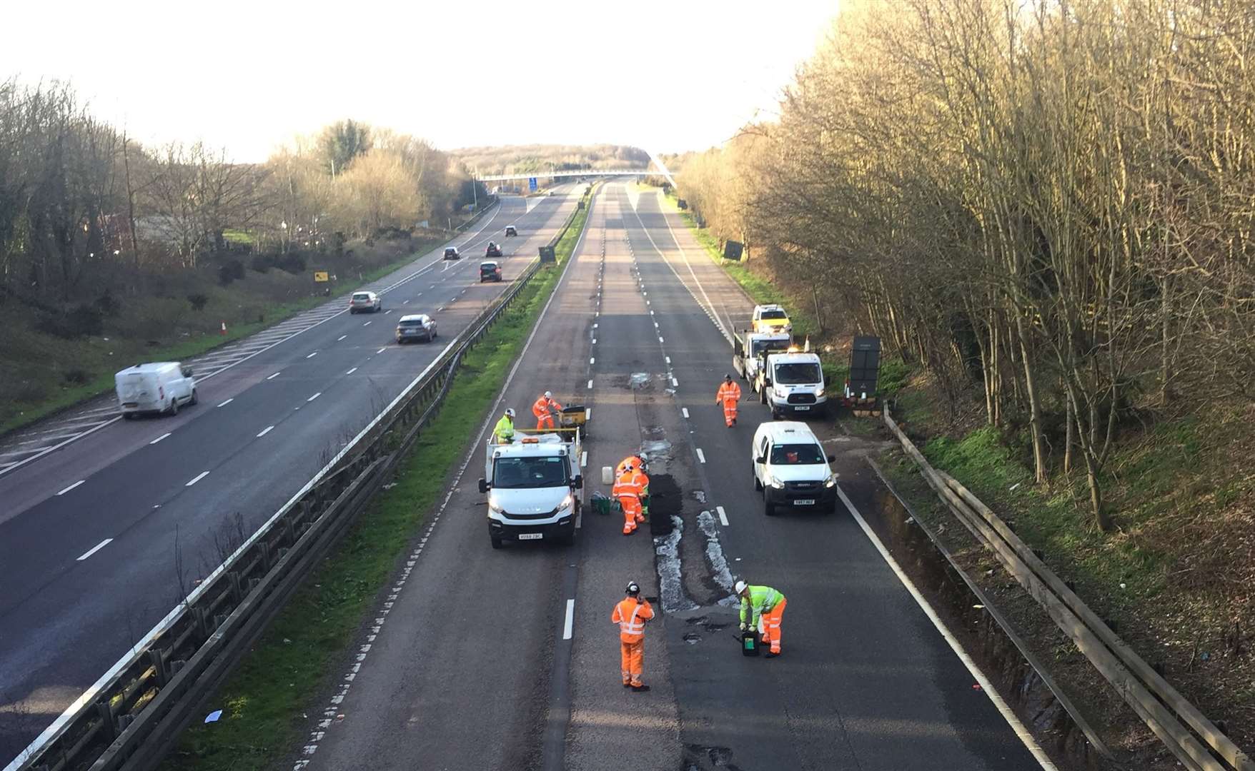 Contractors working on the M20. Picture: Alex Jee