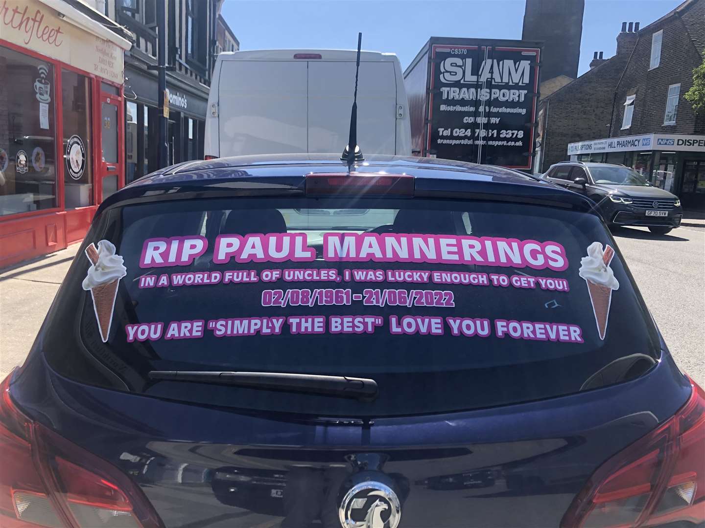 A tribute written on the back of a car