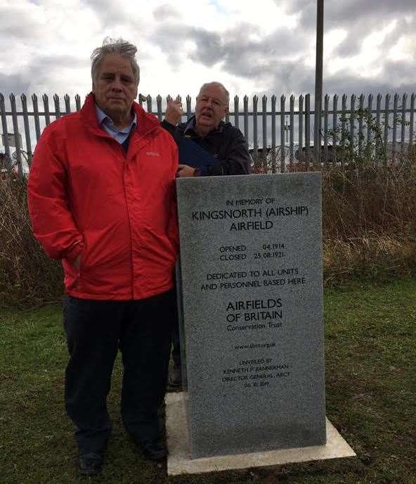 Ron with the commemorative plaque he, as part of Hoo St Werburgh Parish Council, helped place at Kingsnorth Airship Airfield, 2019