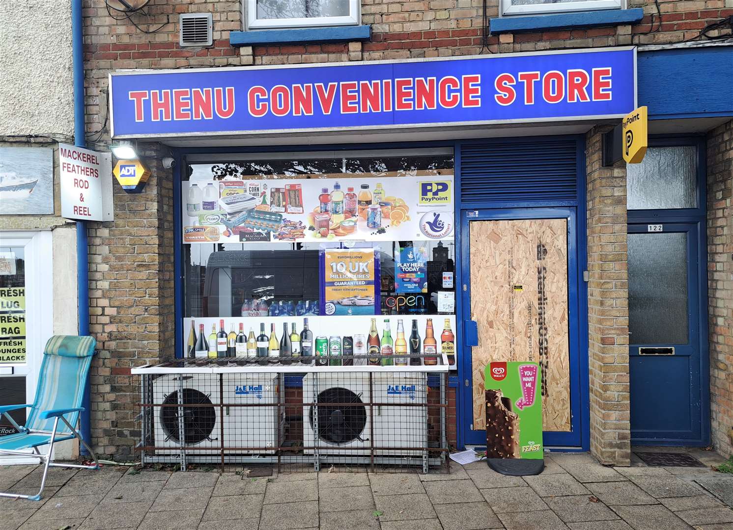 The door to Thenu Convenience Store in Snargate Street, Dover, was boarded up after the incident