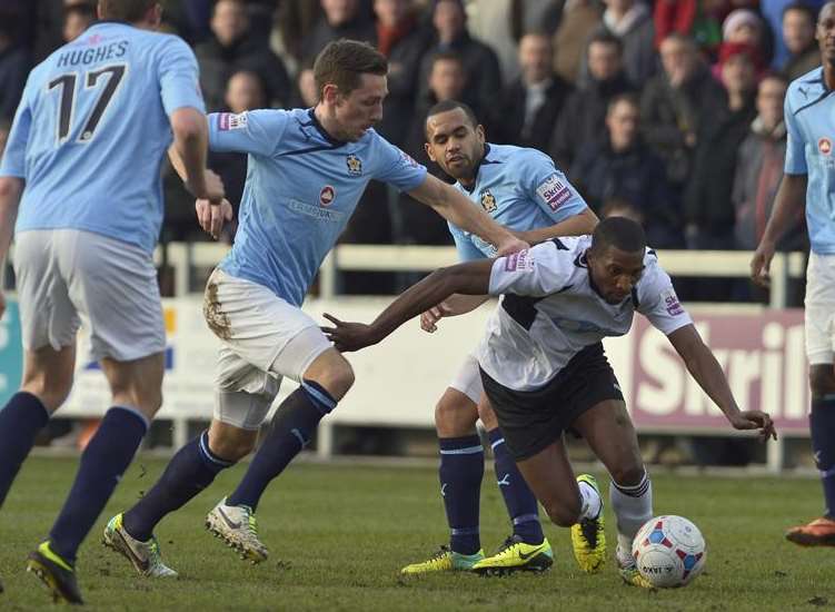 Tyrone Sterling in action for Dartford (white) against Cambridge United. Picture: Andy Payton