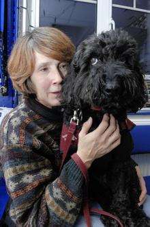Maggie Lee with Clay the Hearing Dog at the Abbots Barton Veterinary Surgery in Canterbury