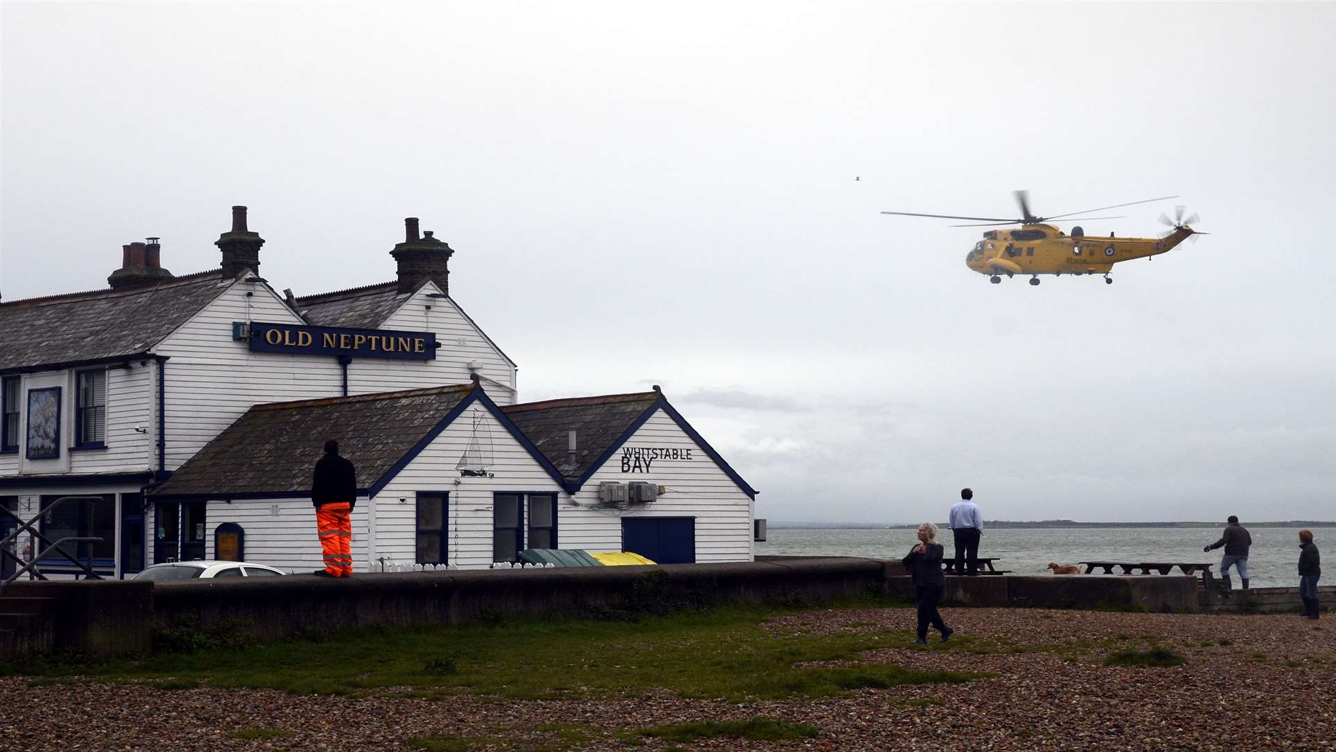 The RAF Sea King helicopter searching near the Old Neptune pub in Whitstable. Picture: Chris Davey