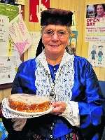 Margaret Bray, with her Victoria sponge and Victorian outfit