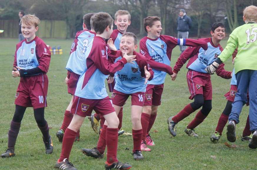 Wigmore Youth United celebrate a goal against Cobham Colts in Under-12 Division 2. Picture: Darren Small