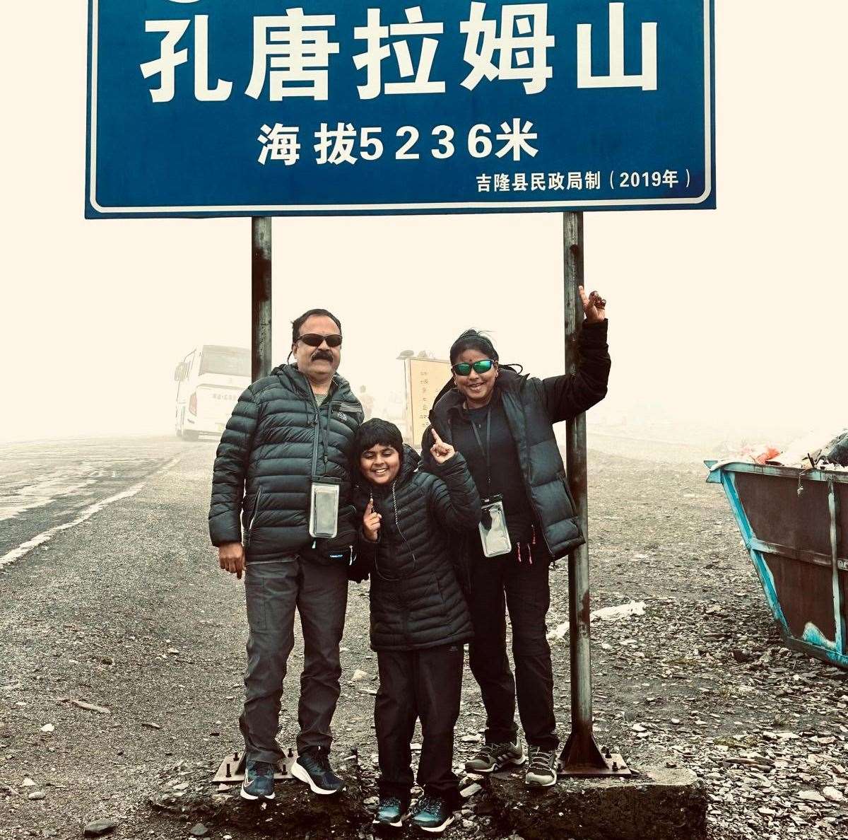 Dr Athmaja Thottungal with her husband and son after conquering the mountain. Picture: East Kent Hospitals University NHS Foundation Trust