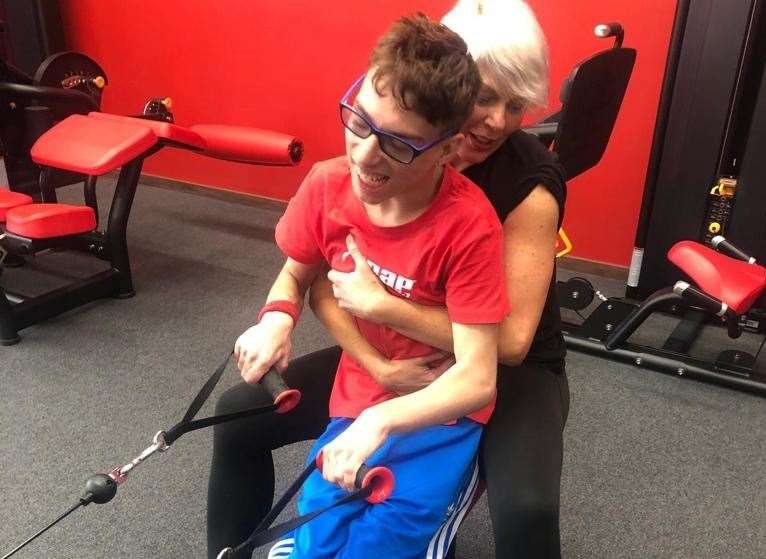 Haydn Ratcliffe working out at Snap Fitness with PT Emma Ashby