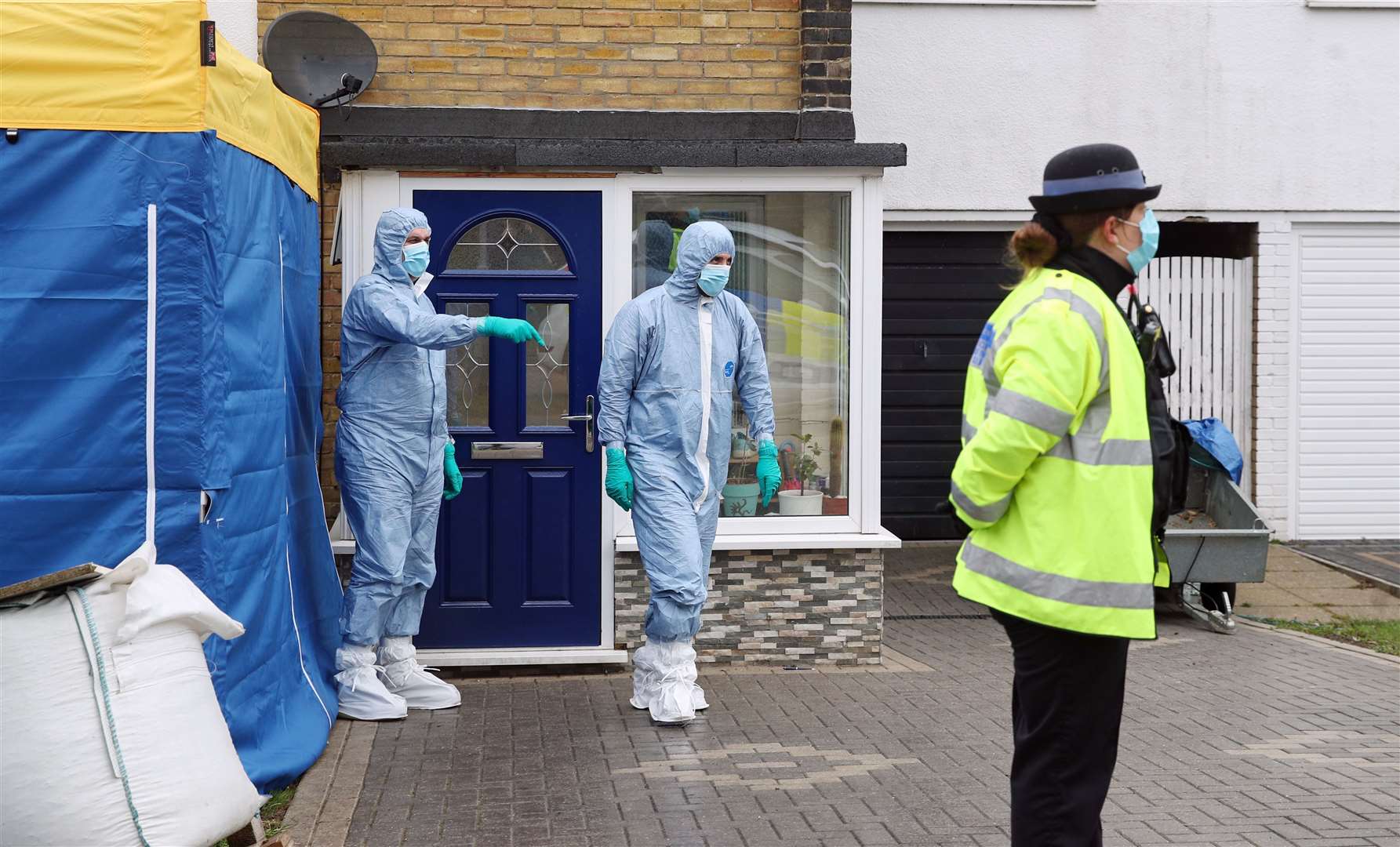 Forensic officers outside a house in Freemens Way in Deal, Kent (Steve Parsons/PA)