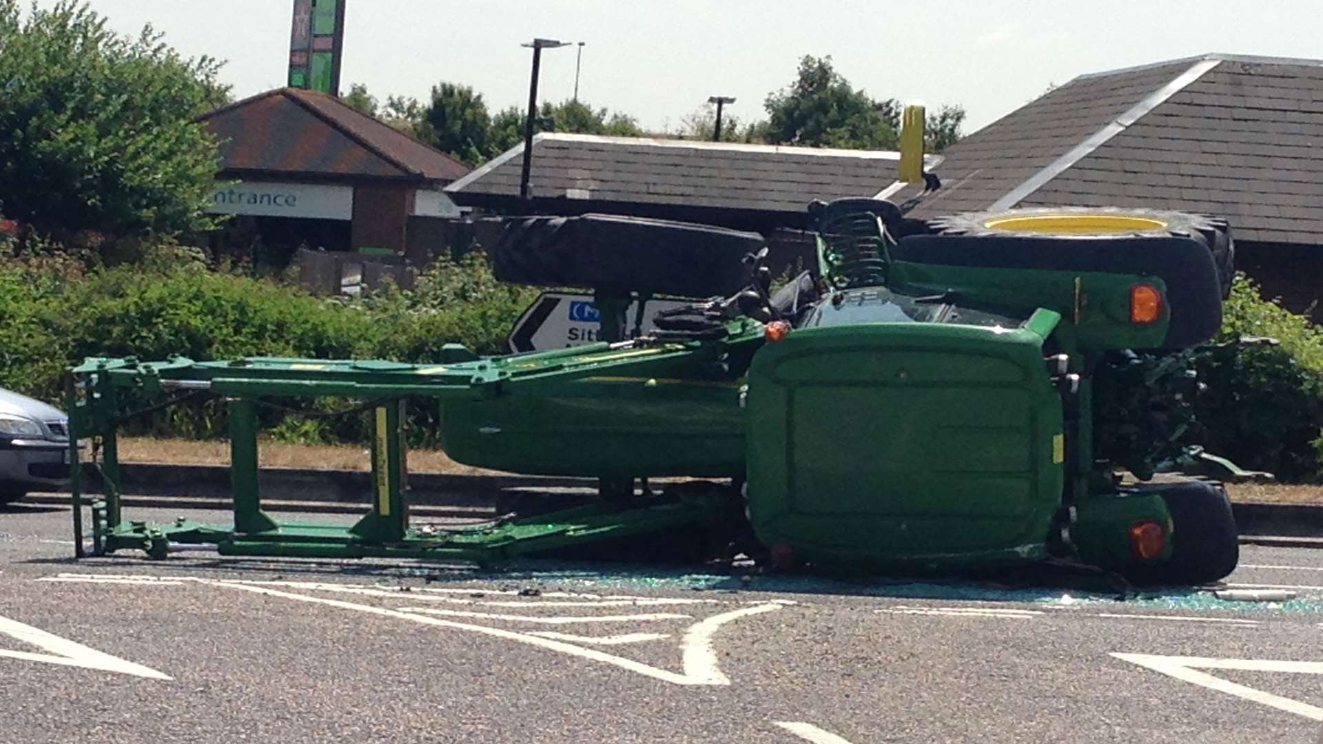 Overturned tractor near the Apple Bobbing services