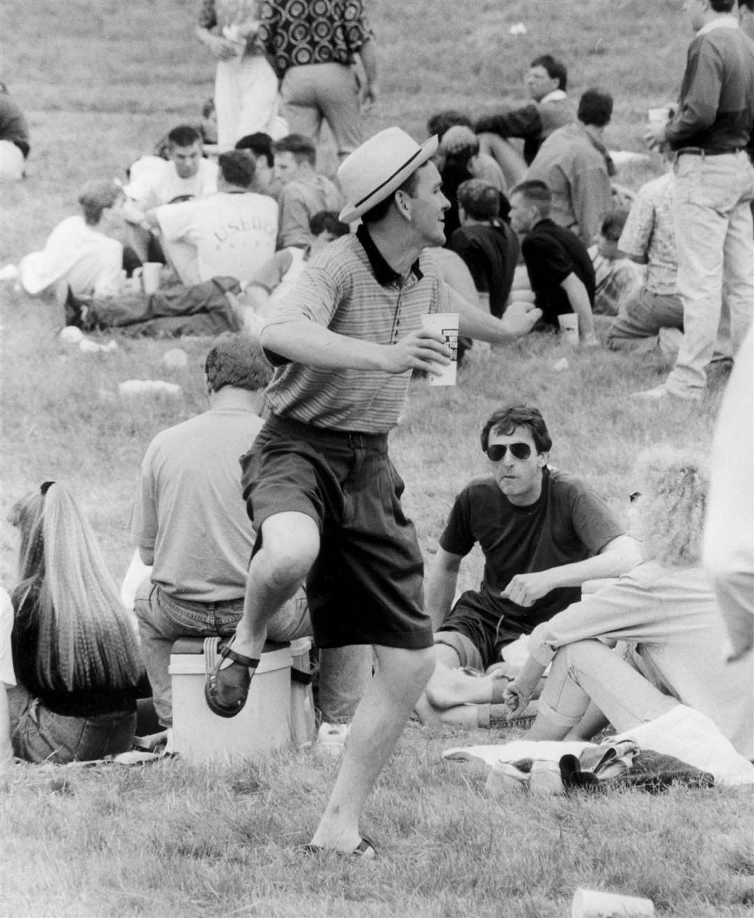 Dancing away in shorts and summer hat on the sunny Saturday in May 1991