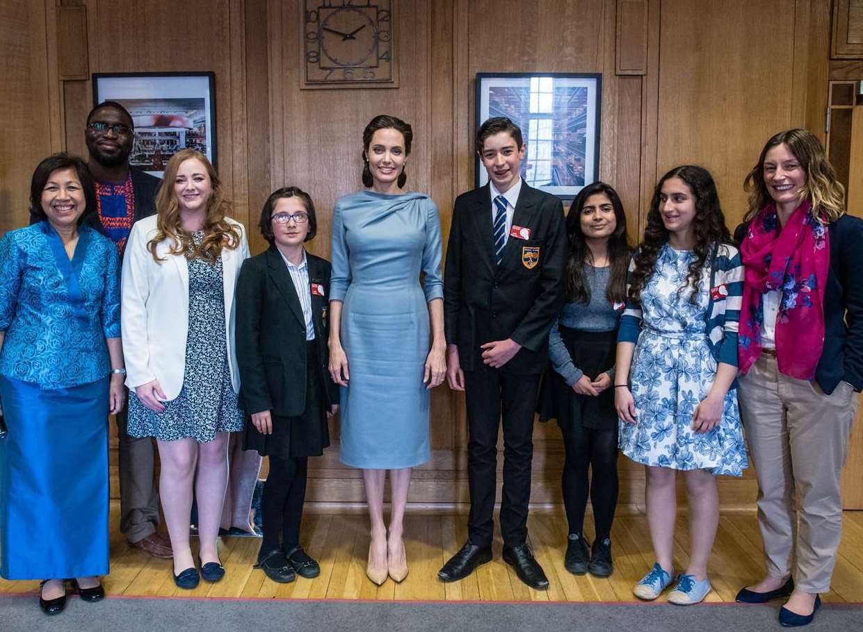 Thomas Aveling teacher Alyce Le Brunn-Healey, third from left, and pupils Freya Dhiman, fourth from left, and Connor Ross, fourth from right, with Angelina Jolie and others at BBC’s Broadcasting House