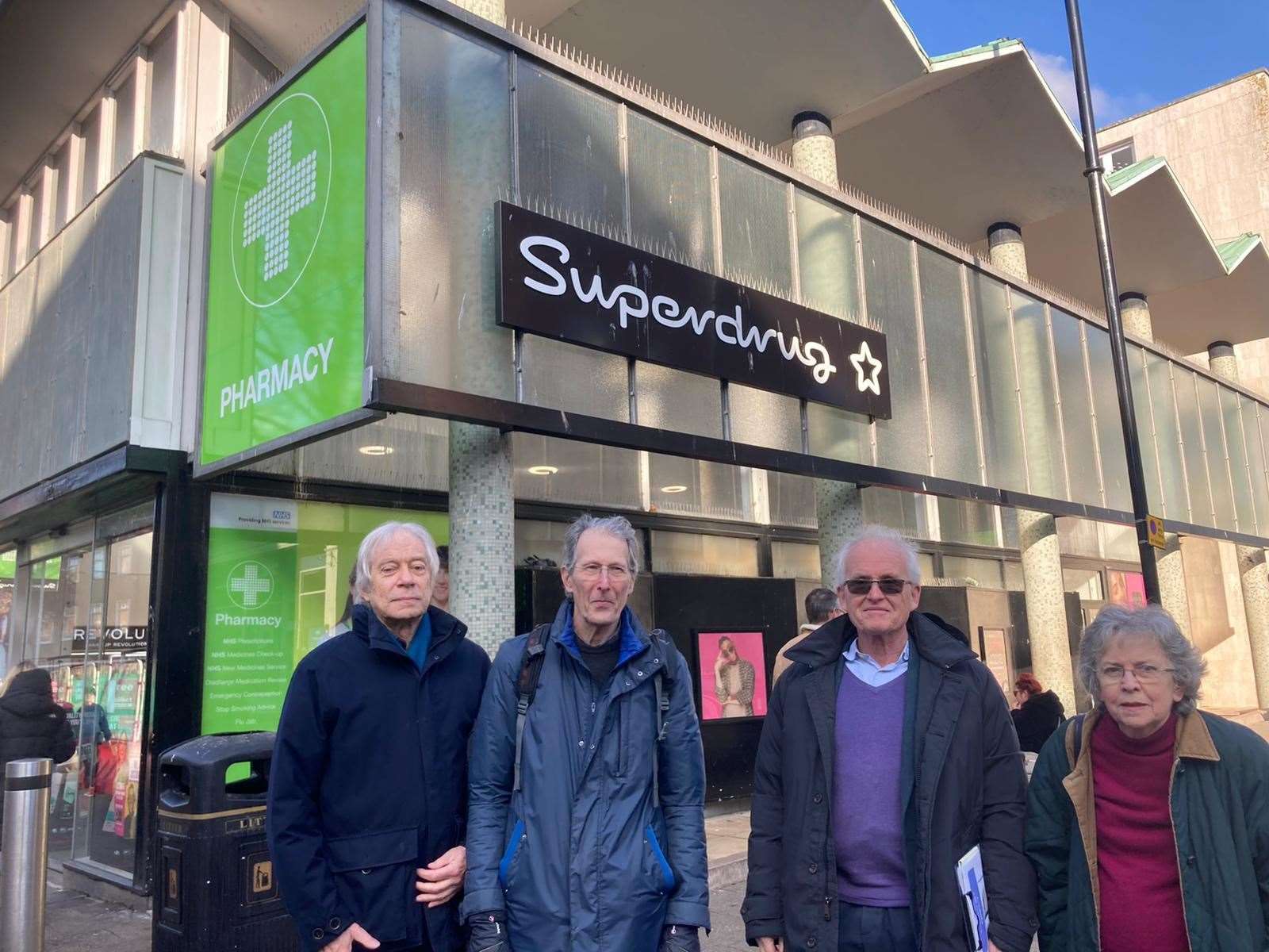 Members of the Canterbury Heritage and Design Forum stood outside the city's Superdrug