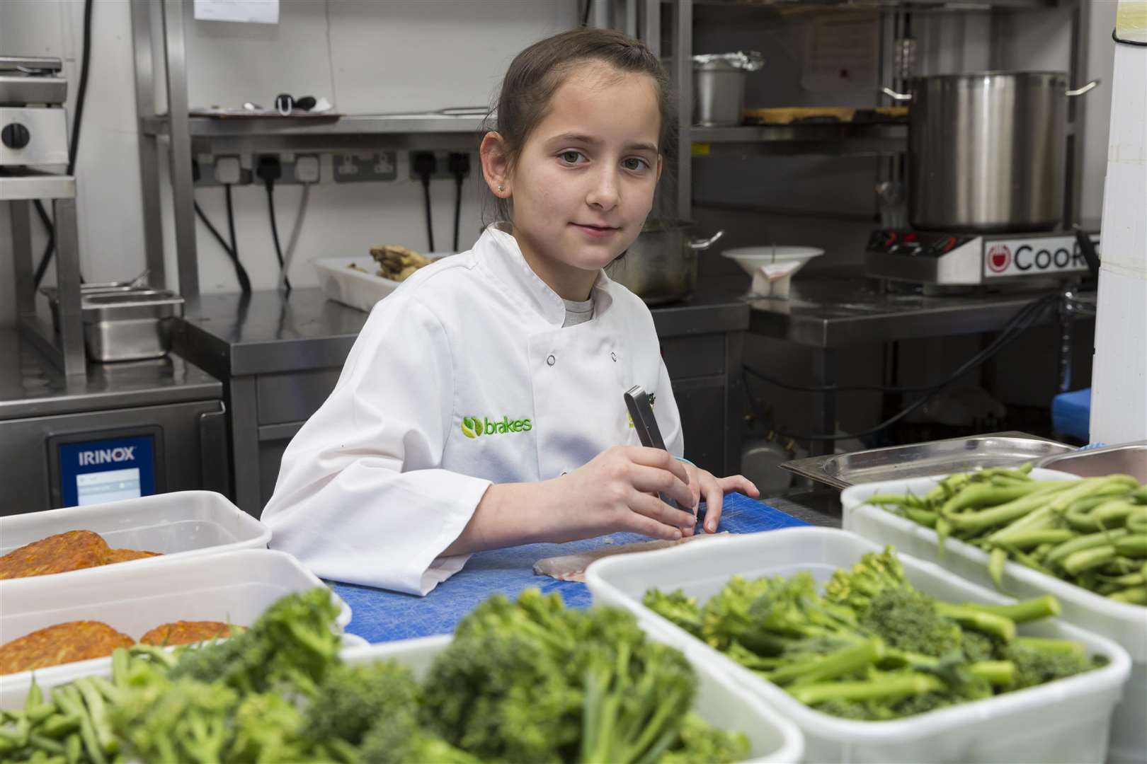 Hard at work preparing the food for the Young Cooks 2018 VIP luncheon: contest champion Boglar of St Nicholas Primary School.
