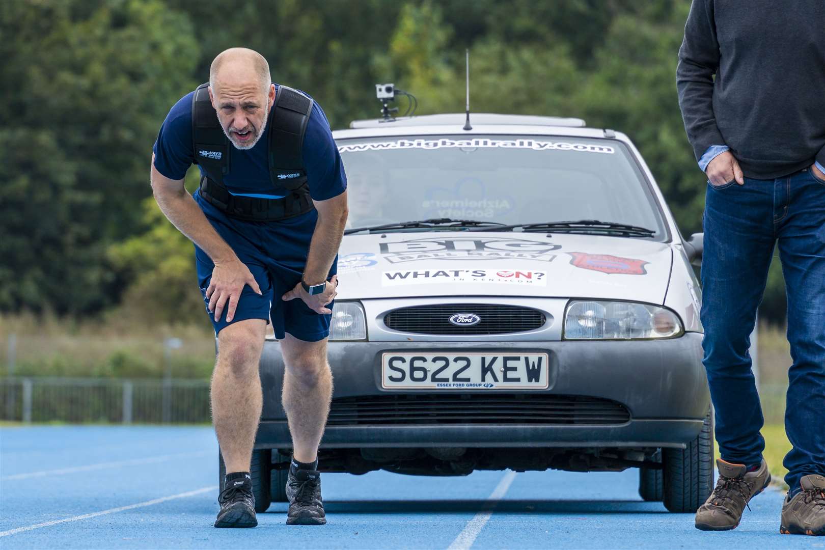 Dave Cooke pulled a car around Dartford Central Park Athletics Track over the equivalent of a half marathon distance. Photo: Ian Cooke/ ICookeImages