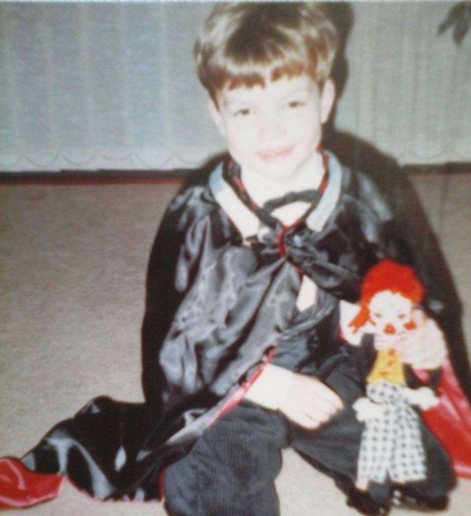 Chris Harding as a five-year-old with a child's magician cape and marionette. Picture: Chris Harding