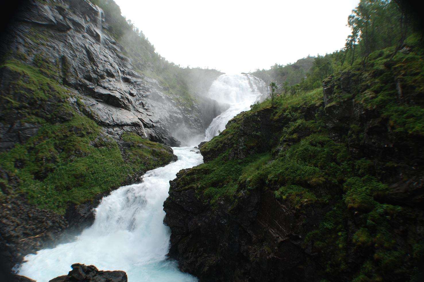 The Kjosfossen Waterfall can be seen from the Flam railway