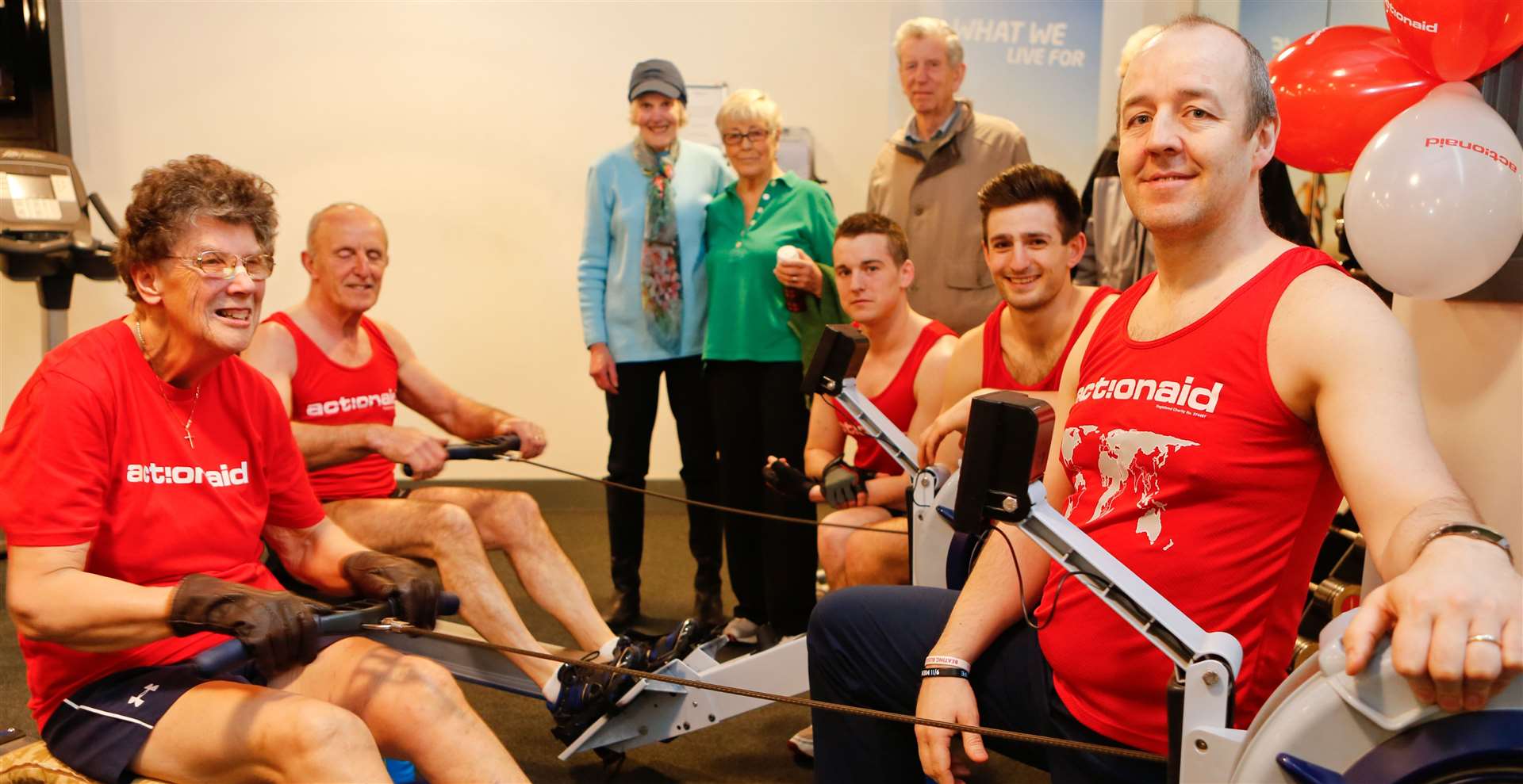 Simon Kavanagh, far right, supporting Margaret Doak in 2013 with a 13-mile charity row at Maidstone Leisure Centre Picture: Matthew Walker