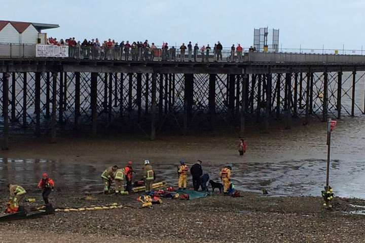 Rescue crews preparing to save the woman from the mud. Image by Stuart Blackledge
