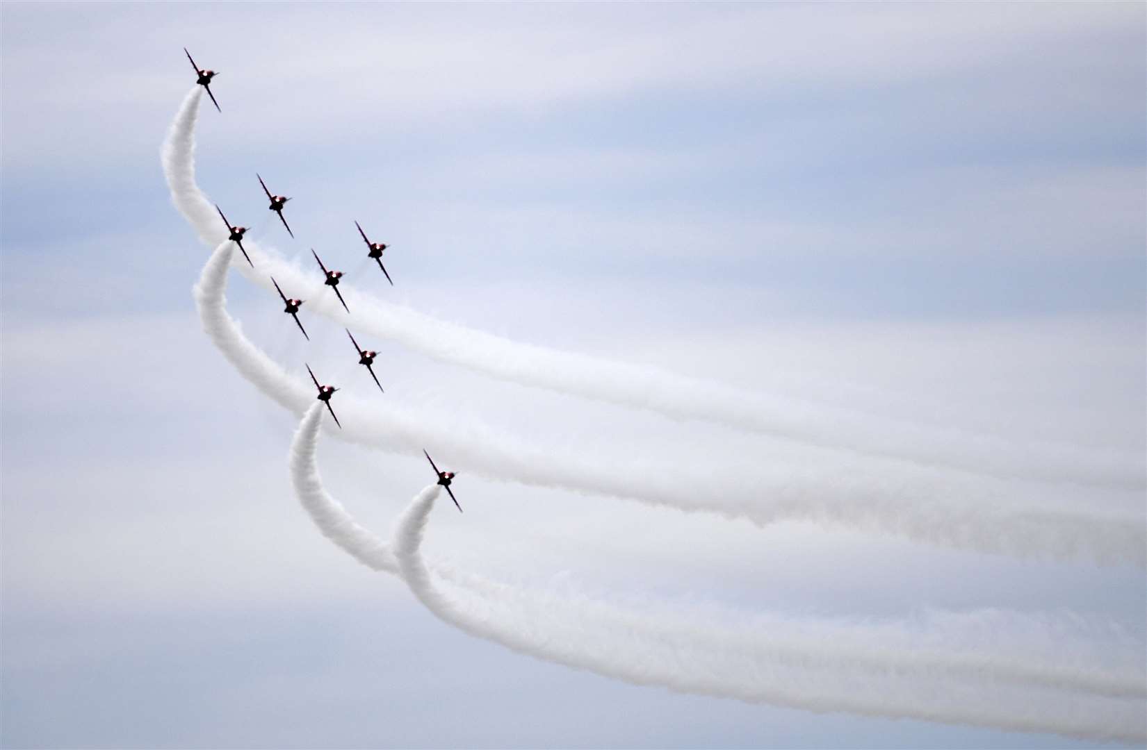 The Red Arrows display team over The Leas, folkestone, Sunday 22nd July, during the Folkestone air show. Picture: Barry Goodwin (3212753)