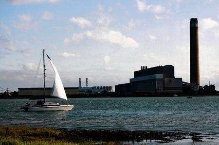 A yacht passes Kingsnorth Power Station