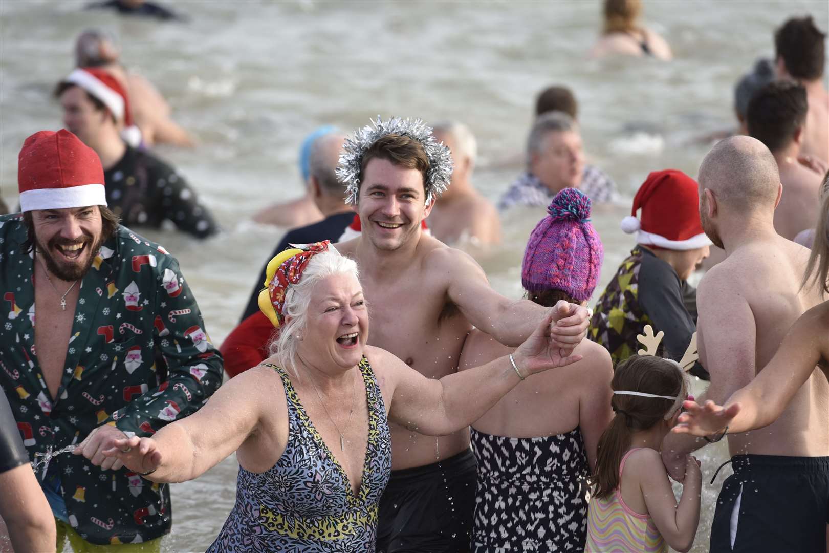 All smiles and fun as the Boxing Day dippers in Deal take the plunge. Picture: Carol Fenton/The Unofficial Photographer