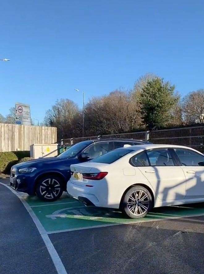 The video shows two BMW cars parked in electric charging spaces, at South Aylesford Retail Park