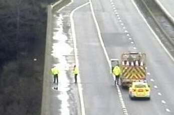 Workers carrying out an inspection of the M2. Picture: Highways Agency