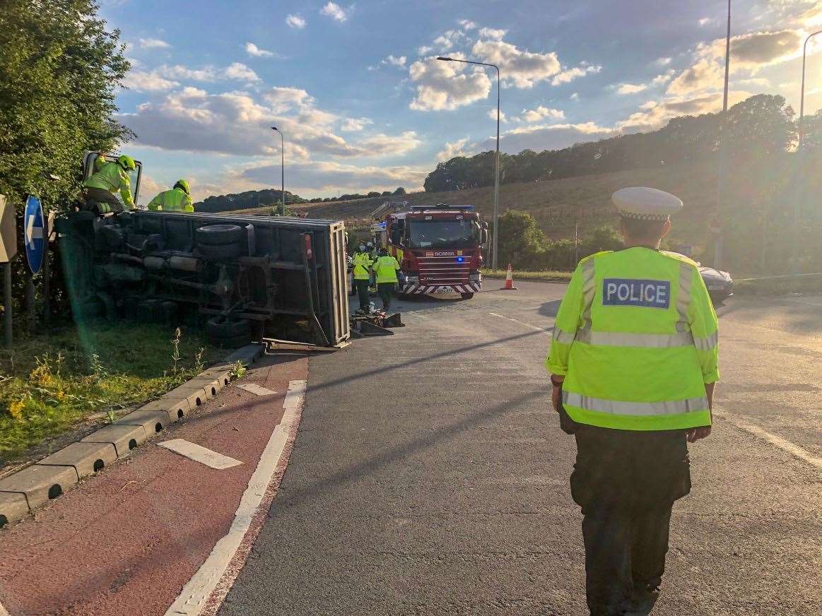 The flatbed van has overturned at Stockbury roundabout. Picture: Kent Police RPU