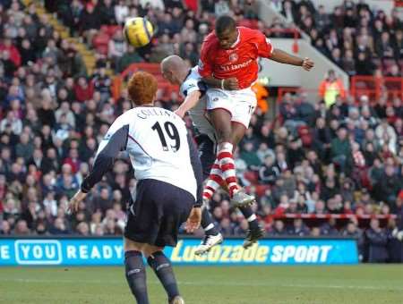 Darren Bent leaps above the West Ham defence to nod in Charlton's second goal. Picture: MATT WALKER