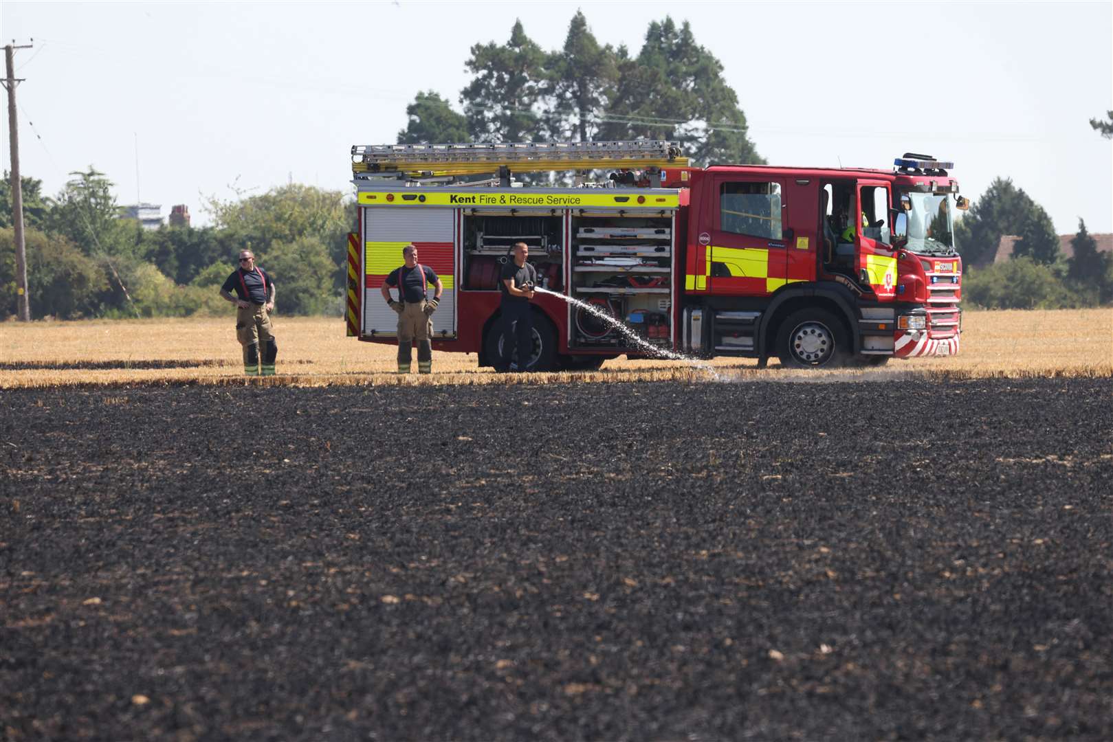Fire crews tackling the large field fire in Sutton Valance near Maidstone. Picture: UKNIP