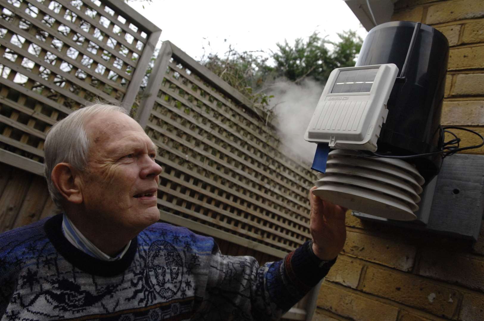 Jeremy Procter and his weather monitoring station. Picture: Chris Davey