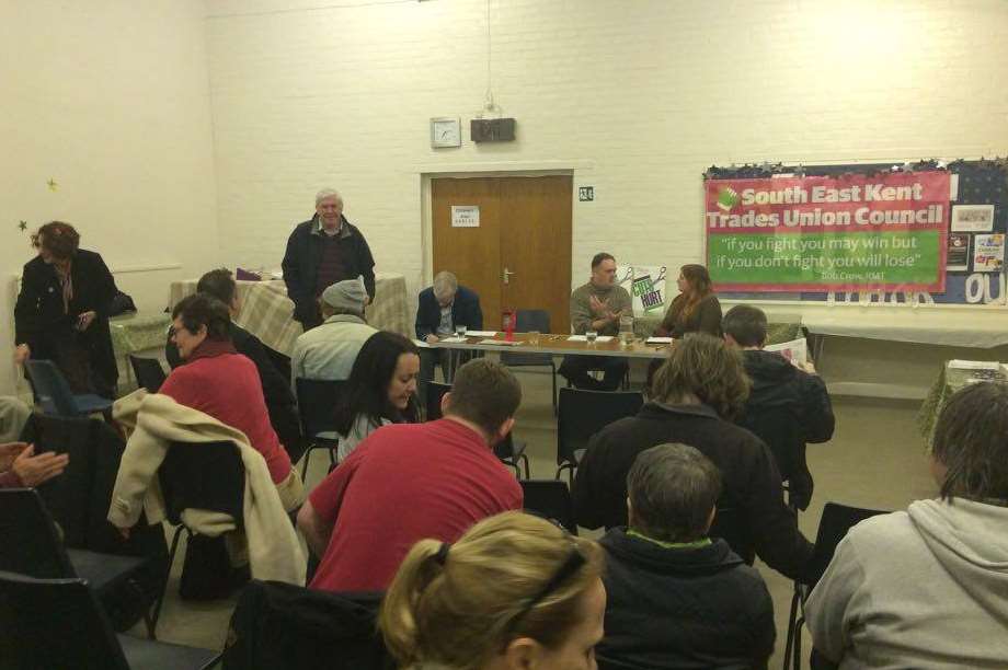 Protesters gather for the anti-cuts meeting in St Faith's Church Hall