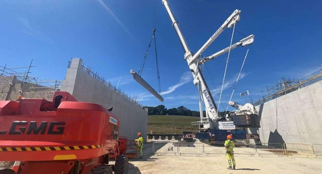 The bridge beam being lifted into place for the Stockbury flyover. Picture: Megan Carr