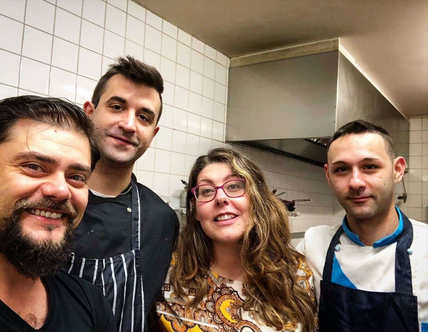 Alessandro Biscardi, left, with three of his staff at Vesuvius restaurant in Maidstone, which is reopening on Saturday
