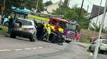 The overturned car on Queenborough Road