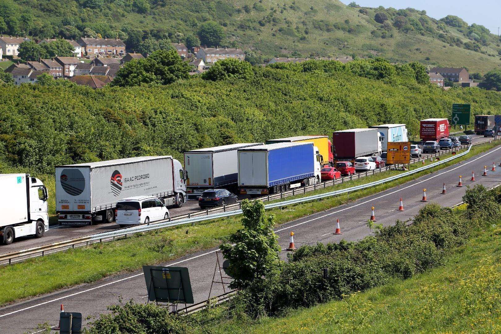 Lorries queued on the A20 heading into Dover. There are concerns Brexit may lead to increased border checks for lorries, leading to large queues