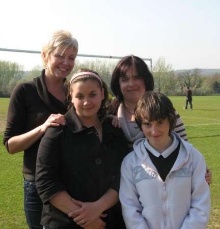 Thanington Neighbourhood Resource Centre manager Paula Spencer (left) and residents' association chair Joanne Ryan with Charlotte Arnak, 15, and Stacey Cook, 14., on the recreation ground