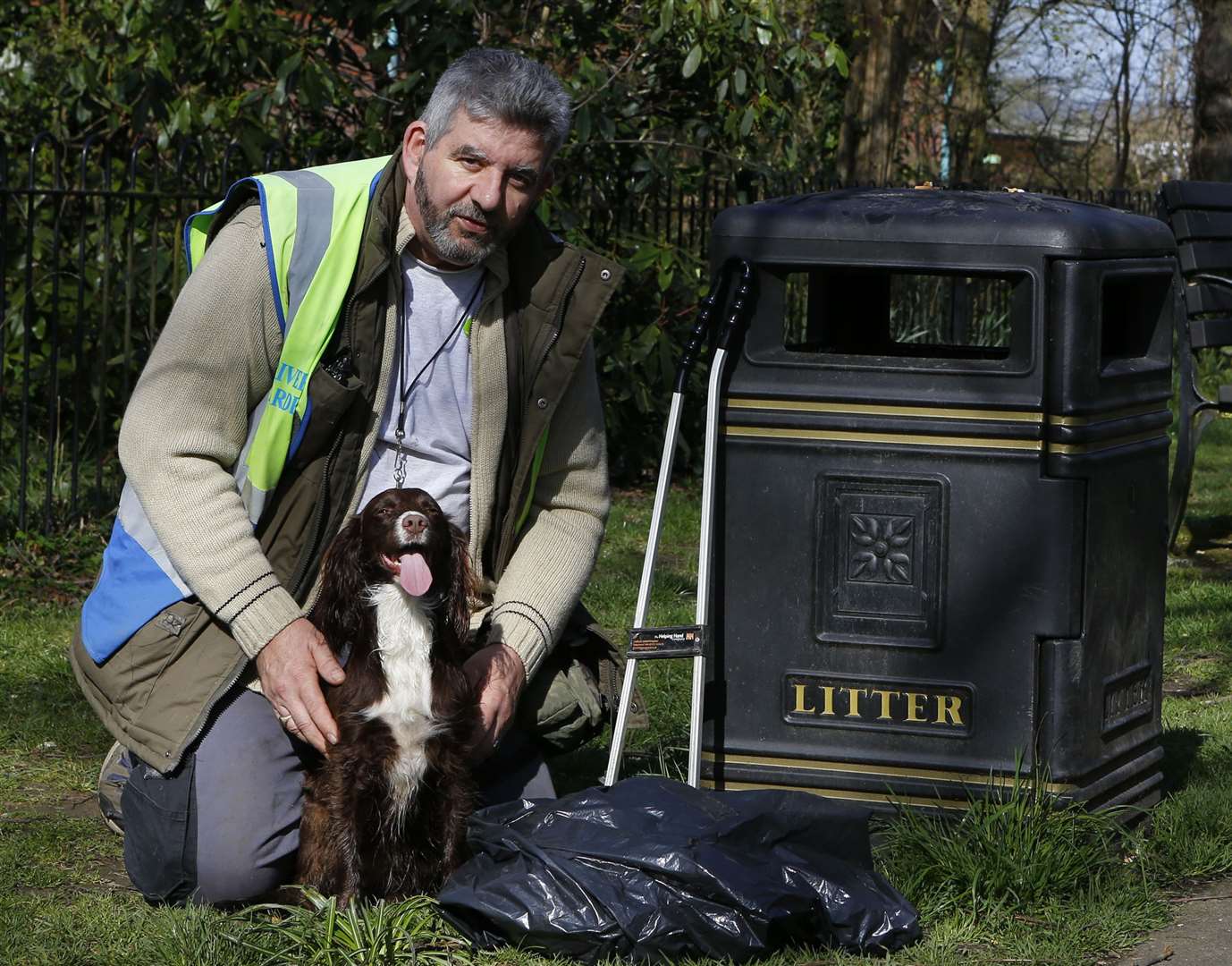 Lulu the litter picking dog with owner Gary Longley. Picture: Andy Jones