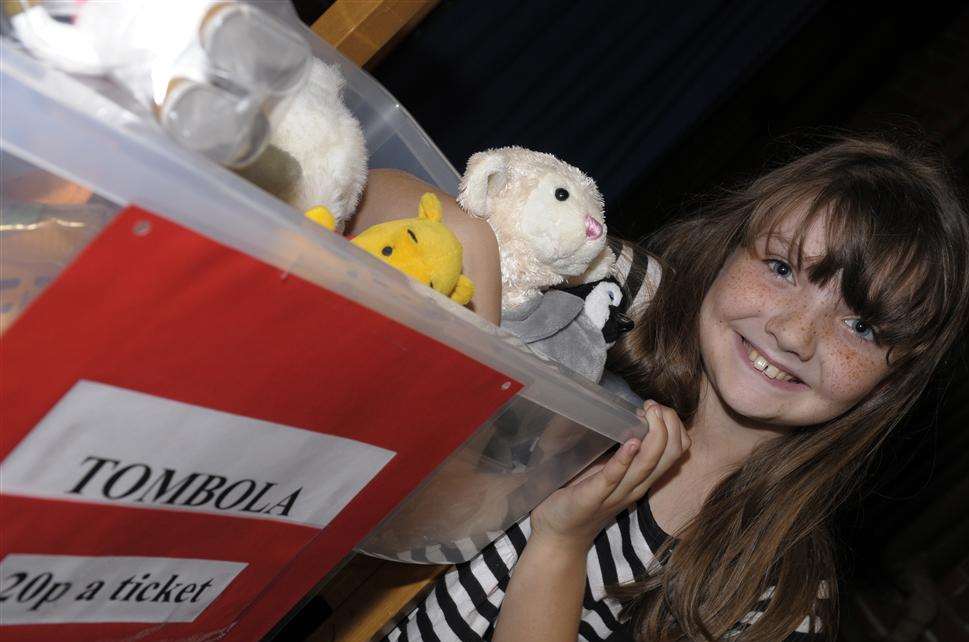 Georgia Hislop, 9, taking part in the tombola