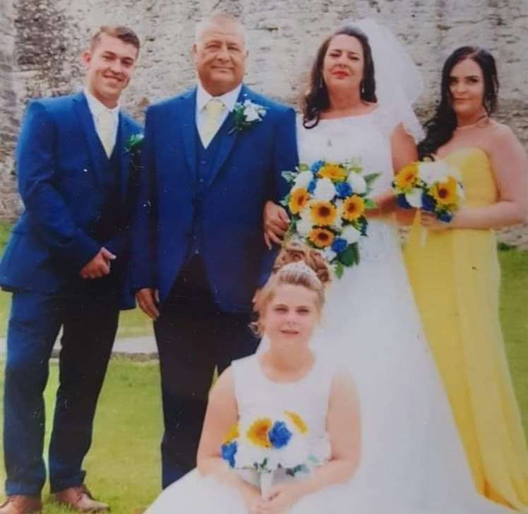 Terry and Lorraine Burrell with son Lee, and daughters Chloe and Becky (front)
