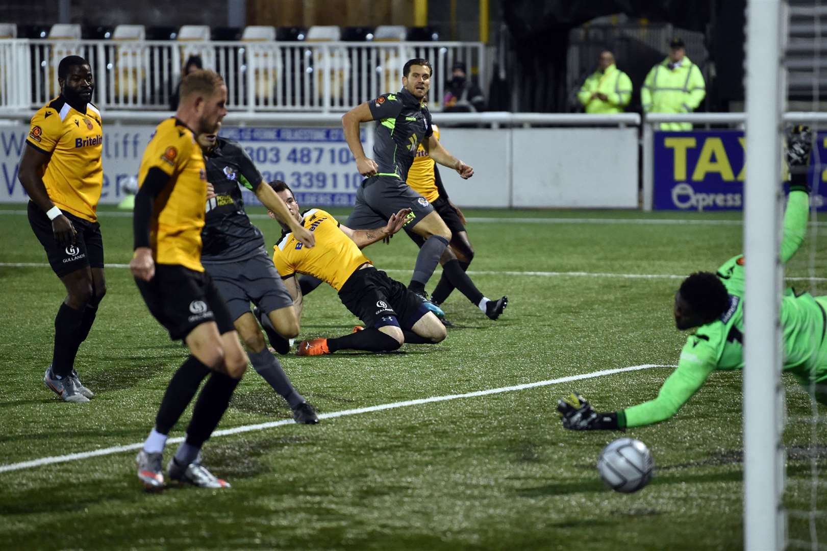 Dartford captain Tom Bonner opens the scoring at Maidstone - minutes after copping an unfortunate one from George Porter Picture: Keith Gillard