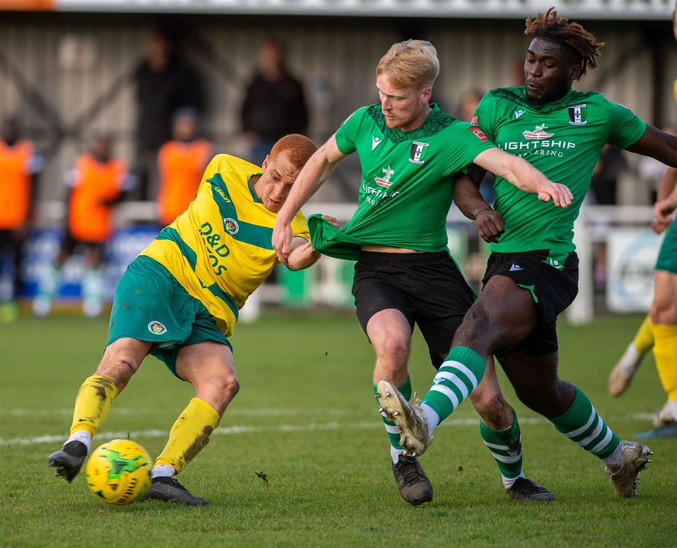Ashford United forward Tashi Jay-Kwayie is outnumbered as he tries to get a shot away Picture: Ian Scammell