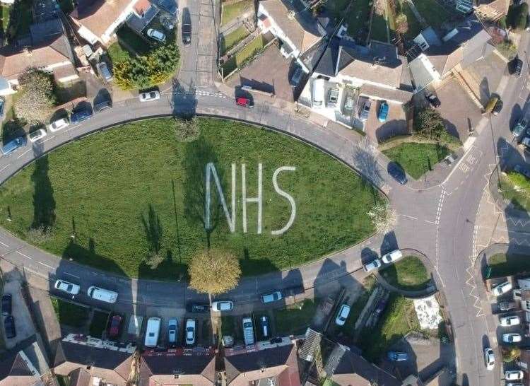 Rene Johnston and his neighbour showed their respect for the NHS with their lawnmowers