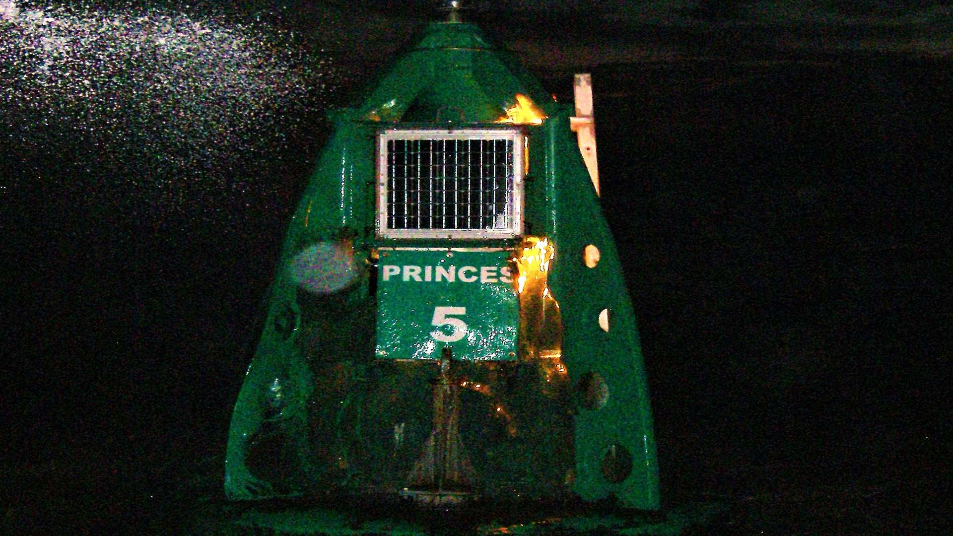 Flames lick around Princess No 5 Light Buoy. Picture: RNLI